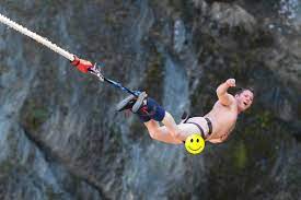 Bungee jumping, sport in which the jumper falls from a high place with a rubber (bungee) cord attached both to his or her feet and to the jump site, and, after a period of headfirst free fall. Naked Bungee Jumping In Queenstown New Zealand Photos Travelfreak