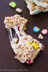 Take A Break From Traditional Rice Krispie Treats And Make These Super Gooey Lucky Charms Treats Instead And Lucky Charms Treats Cereal Treats Krispie Treats