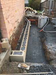Property Drainage Works Retaining Wall Under Construction To Allow An Air Gap Between The Foundat Yard Drainage Waterproofing Basement Retaining Wall Drainage