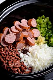 Remove from the heat and cool until the hock is cool enough so you can remove the meat from the bone. Slow Cooker Red Beans And Rice Recipe Add A Pinch