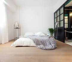The faux marble finish creates elegant texture on the piece. Here S How To Put Your Bed On The Floor Without It Looking Sloppy Dwell