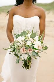 Would you carry fake blooms instead of fresh flowers down the aisle? Beach Wedding Bouquet Wedding Weddings Weddinginspiration Aislesociety Beachwedding Bridal Bouquet Pink Beach Wedding Flowers Flower Bouquet Wedding