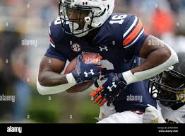 Auburn wide receiver Malcolm Johnson Jr. (16) catches a pass for a  touchdown as Alabama State defensive back Rodney Echols (25) defends during  the second half of an NCAA football game Saturday,