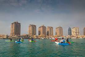 Qatar Why You Want To Stop Over Instead Of Flying Through Doha Skyline Man Made Island Kayaking