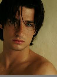 'not just dark skin and blue eyes, because you can get that combination, but also the face shape. Wes Brown Love His Dark Brown Hair Blue Eyes And Freckles Black Hair Blue Eyes Dark Hair Blue Eyes Dark Haired Men