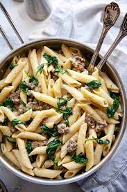 Creamy Italian Sausage Pasta Pasta With Sausage And Spinach In The Creamiest Garlicky Parmesan Sauce Pure Italian Sausage Pasta Sausage Pasta Pasta Recipes