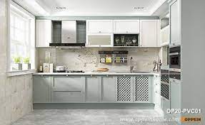 Shaker kitchen cabinets is a phenomenon that is gaining momentum thanks to the growing popularity of stainless steel countertops and ergonomic kitchen designs that incorporate this furniture pattern. Small Country Style Pvc Shaker Kitchen Cabinet Op20 Pvc01 Oppein The Largest Cabinetry Manufacturer In Asia