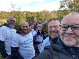 Friends complete Rodley to city centre walk in memory of Jason Salvin