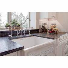 This sink is rectangular, and so all sides have the same depth. St Ives 33 Fireclay Kitchen Sink With Intricate Embossed Vine Design Front Apron On One Side And An Elegant Beveled Front Apron On The Other Side 33 W X 20 D X 10 H By