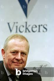 Image of Sir Colin Chandler, chairman of Vickers plc, sits in his