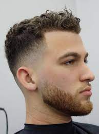 15 Top Fade Hairstyles For Men To Look Stylish Dashing Hairdo Hairstyle Men S Curly Hairstyles Curly Hair Men Wavy Hair Men