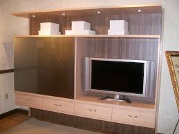 Our reputation for innovative solutions that meet customers' virtuoso entertainment center in textured venetian wenge and bellissima white finishes. Virtuoso Tm Photos California Closets Twin Cities And Rochester