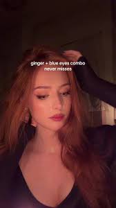 Mixed Girl with Blue Eyes and Ginger Hair