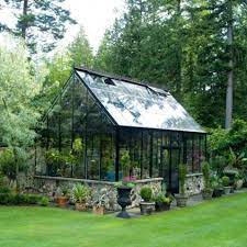 Greenhouses Bring Gardens In From The Cold Contemporary Greenhouses Greenhouse Greenhouse Plans