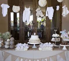 Add some baby bibs and you have yourself a cute backdrop for the party! Easy Baby Shower On A Budget Tulamama