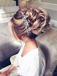 This haircut looks stunning when styled right because it enhances the natural texture and flow of your locks! 25 Chic Updo Wedding Hairstyles For All Brides Elegantweddinginvites Com Blog