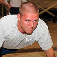 Army Captain Leo White, left, from Fort Carson, Colorado, a member of the  judo team competing at the 1984 Summer Olympics