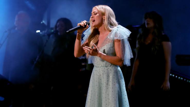Watch Carrie Underwood's Breathtaking Vince Gill Tribute Performance |  iHeartCountry Radio