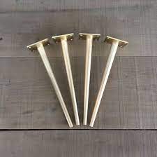 With an included open shelf and drawer under the table's surface, this table provides extra storage for magazines, table books, remotes, and more for easy organization. Brass Coffee Table Legs 16 Bitlis Tapered Table Legs Etsy Brass Table Legs Brass Coffee Table Coffee Table Legs