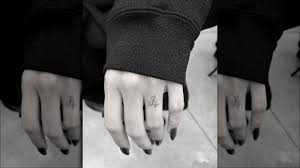 Bieber has over twenty tattoos and you'd never know it. The Meaning Behind Hailey Bieber S New Finger Tattoo