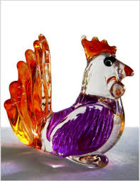 The glass is handmade by adding multiple colors to crystal glass hot. Rooster Glass Miniatures Marketplace