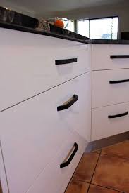 High gloss white cabinet with shelves and led white lights. The Beauty Of Natural Granite