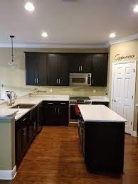What color hardwood floor with espresso cabinets with black appliance. What Color Hardwood Goes Well With Espresso Cabinets