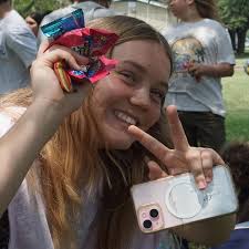PIÑATA PROS: Vaughn Shields and Jasmine Holcomb hold their well-deserved  piñata, as their Spanish 1 class prepares for its piñata party. Both  Shields and Holcomb were voted to be their class's king