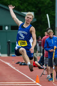 Hometeam track: Holy Name's Dennis rules 100, Douglas second