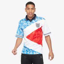 This was the first blue england football shirt used since 1970 world cup dennis wise scored his one and only international goal wearing this shirt iconic and one of the most popular england retro football shirts Score Draw England 1990 Mash Up Shirt Tops Mens Replica Pro Direct Soccer
