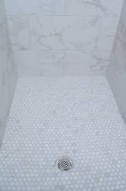 The white bathroom is as popular as the white kitchen, and basic white tile — whether it's a 4x4 or 3x6 — can be really affordable. Affordable Tile Selections For Your Home Monica Wants It Affordable Tile Marble Look Tile Master Shower