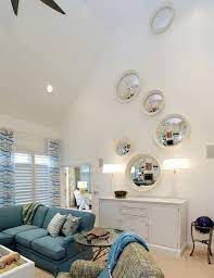24 Ideas On How To Decorate Tall Walls Remodelaholic Tall Ceiling Living Room Vaulted Ceiling Living Room High Ceiling Living Room