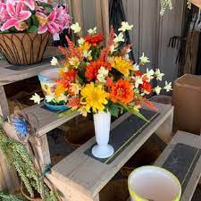 Celebrate the christmas season with this gorgeous poinsettia basket decorated with a holiday bow, gold ting ting and pinecones. Flowerama Cedar Rapids 12 Photos Florists 3326 Johnson Ave Nw Cedar Rapids Ia Phone Number Products Yelp