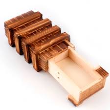 I've seen a few of these types of combination boxes and thought they would be great for use in role playing wooden puzzle lock for secret door: Home Furniture Diy Wooden Puzzle Box Brainteaser Magic Secret Compartment Gift Pettumtrampolines Es