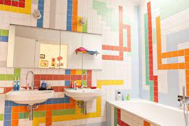 This colorful demeanor is further augmented by the colorful shower curtain of the white shower area. Chic Creative Kid Bathroom Ideas
