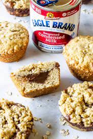 Baked Oatmeal Cups With Chocolate Filling Recipe Milk Recipes Dessert Condensed Milk Recipes Desserts Milk Recipes
