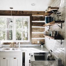 I Seem To Be Drawn To Log Cabins Lately I Love This Simple Yet Sophisticated Kitchen Via Log Cabin Kitchens Log Home Kitchens
