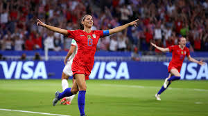 Female football player looking down