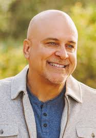 Nation welcomes 26 new citizens COUNTY OF CHAMPIONS