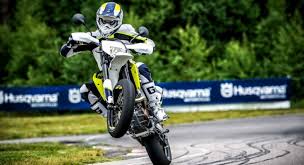 Ducati 1198 superbike superbike racing 1 4k hd desktop wallpaper. How To Make Your Dirt Bike Street Legal Husqvarna 701 Supermoto Wheelie 1156x629 Wallpaper Teahub Io