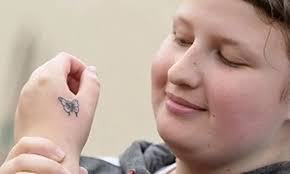Fundraisers get tattoos in aid of Myton Hospice