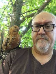 This is my handsome Mille fleur d'uccle boy, Blackbeard🐓 He's the oldest  rooster of all birds in my flock, and is daddy to like half of them😂 He  has the best temperament,
