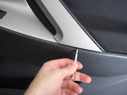 Carefully set the door panel on the ground. Toyota Camry Interior Door Panel Removal Guide 002