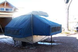 If you're looking for more of a true camping experience while still being inside of a trailer, a pop up camper might be the ideal fit for you. Vintage Pop Up Camper This Is Our Old Camel Pop Up Camper Flickr