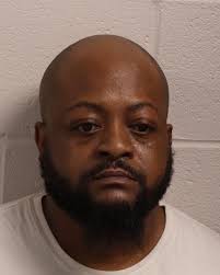 Previously convicted murderer sentenced to prison for firearm possession