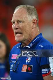 Darcie Davies and Lauren Bella of the Suns celebrate victory during... News  Photo