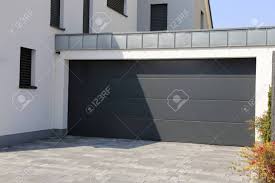 Residential garage doors are some of the best in the industry. Modern New Garage Door Sectional Door Stock Photo Picture And Royalty Free Image Image 125618625