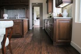 I do not like my current floors, they look orange. Distressed Alder Kitchen With Solid Walnut Floors Black Glazed Cabinets Kitchen Cabinet Trends Black Walnut Flooring Diy Kitchen Cabinets