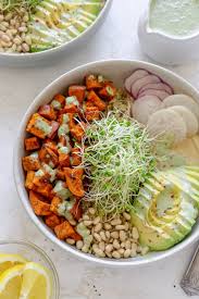 In a small bowl, stir together the chili powder, garlic powder, onion powder, dried oregano, paprika, ground cumin and 1 teaspoon salt and 1 teaspoon pepper. Roasted Sweet Potato Bowls Vegetarian Recipe