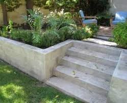 Building a retaining wall on a sloping property can have several benefits for property owners, as follows: Simple Deck Stairs Outdoor Spaces 36 Ideas 2019 Deck Ideas In 2021 Landscaping Retaining Walls Cinder Block Garden Wall Cinder Block Garden